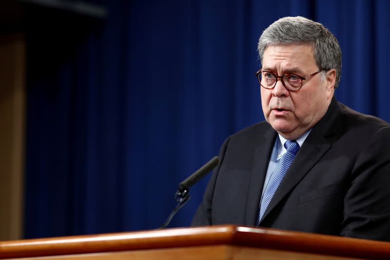 FILE PHOTO: U.S. Attorney General Barr announces findings from Pensacola shootings investigation during news conference at Justice Department in Washington