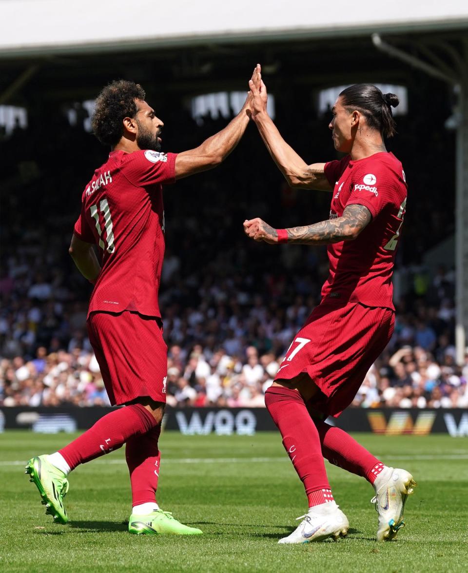 Liverpool’s Mohamed Salah, left, celebrates with Darwin Nunez, right, after scoring in their 2-2 draw with Fulham (Adam Davy/PA) (PA Wire)