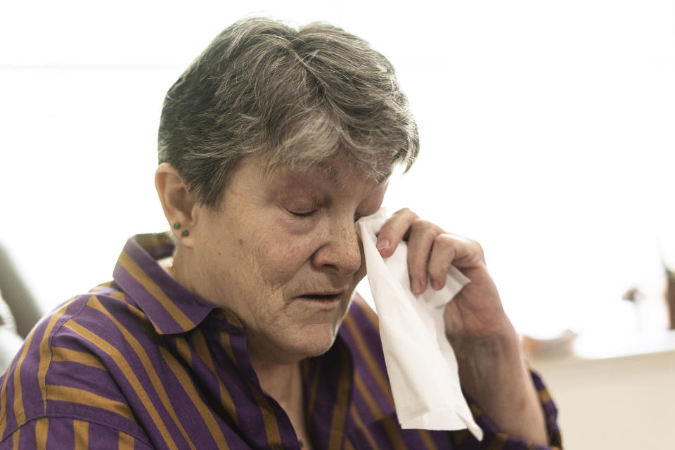 Georgene White pauses as she speaks about her mother, Teri Sheridan, in Belvidere, N.J., Thursday, April 20, 2023. At age 93, struggling with the effects of a stroke, heart failure and recurrent cancer, Sheridan was ready to end her life using New Jersey's law that allows medically assisted suicide - but she was bedbound, too sick to travel. So on Nov. 17, 2022, surrounded by three of her children, Sheridan drank a lethal dose of drugs prescribed by a doctor she had never met in person, only online. She died within minutes. (AP Photo/Matt Rourke)