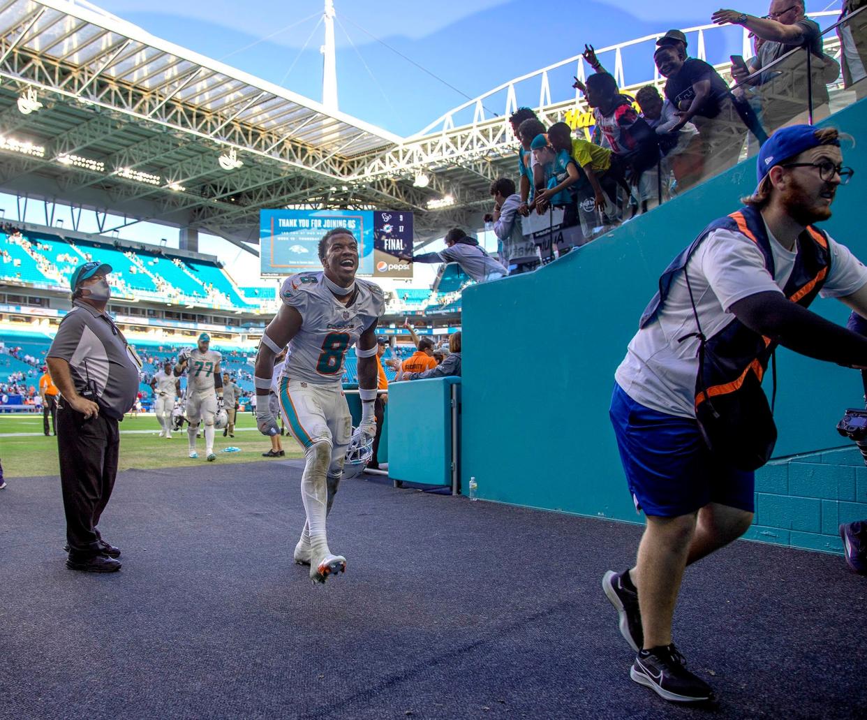 Miami Dolphins free safety Jevon Holland celebrates as he leaves the field at Hard Rock Stadium.