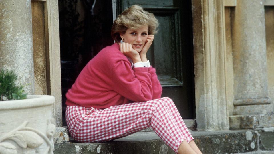 32 of the best Princess Diana Quotes -  Diana sat in pink Gingham trousers