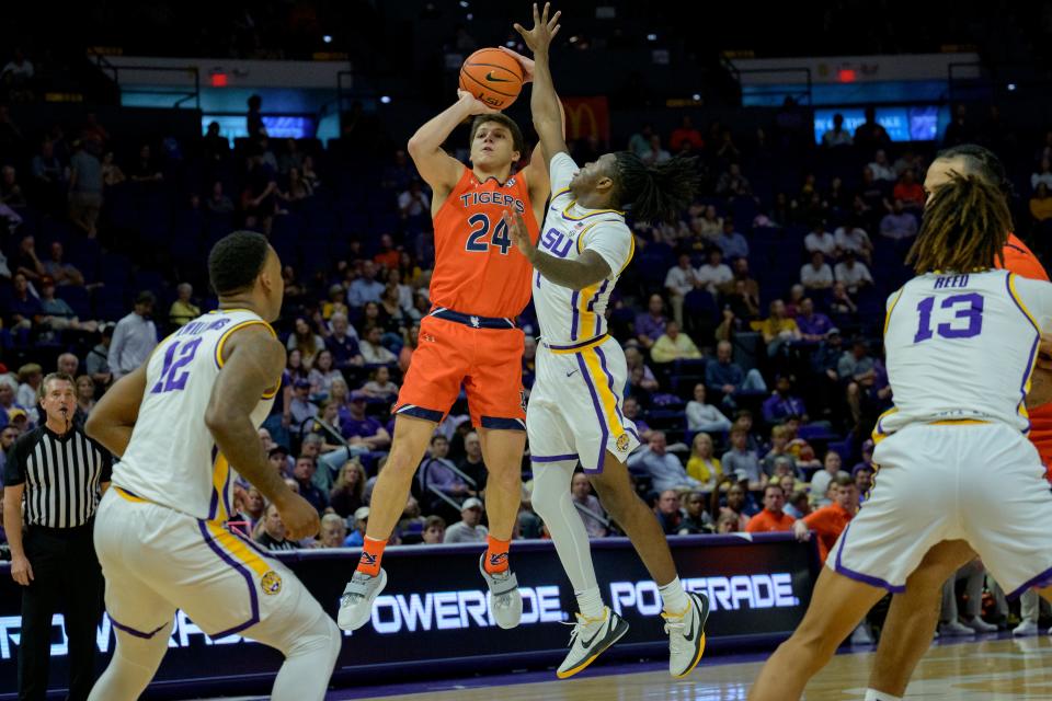 Auburn guard Lior Berman (24) shoots against LSU guard Cam Hayes (1) during the first half of an NCAA college basketball game in Baton Rouge, La., Wednesday, Jan. 18, 2023. (AP Photo/Matthew Hinton)