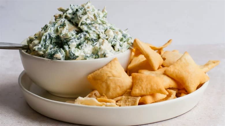 Spinach artichoke dip with pita chips
