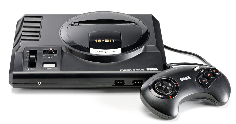 A Sega Mega Drive video game console and controller photographed on a white background, taken on March 26, 2009. (Photo by Neil Godwin/GamesMaster Magazine via Getty Images)