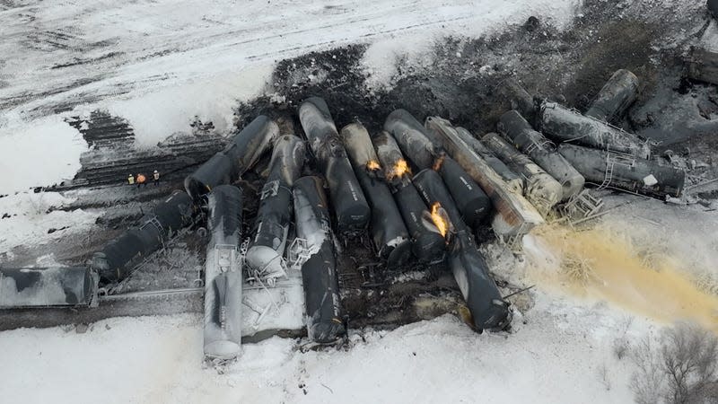 Aerial view of the scene after a BNSF train carrying ethanol and corn syrup derailed and caught fire in the west-central Minnesota town of Raymond early Thursday, March 30, 2023, and residents living near the scene were evacuated in the middle of the night. Burlington Northern and Santa Fe Railway train derailment, Raymond, Minn. 