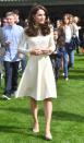 <p>The Duchess of Cambridge made an appearance at a garden tea party hosted by Buckingham Palace; the event recognized young lives lost while serving the armed forces. She wore a polished, ivory dress from See by Chloé. The lace top had a ruffled neckline and ruffled sleeves, and the Duchess brought it together with the skirt with an Acne Studios belt. </p>