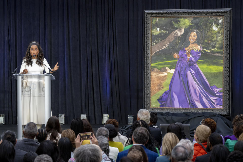 Oprah Winfrey, speaks next to her portrait, Wednesday, Dec. 13, 2023, during a portrait unveiling ceremony at the Smithsonian's National Portrait Gallery in Washington. (AP Photo/Jacquelyn Martin)