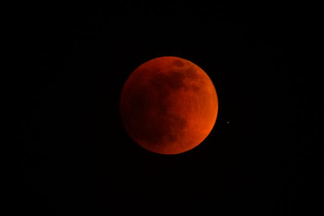 A total lunar eclipse seen from Temple City, California, on May 15, 2022. (Photo: AP Photo/Ringo H.W. Chiu))