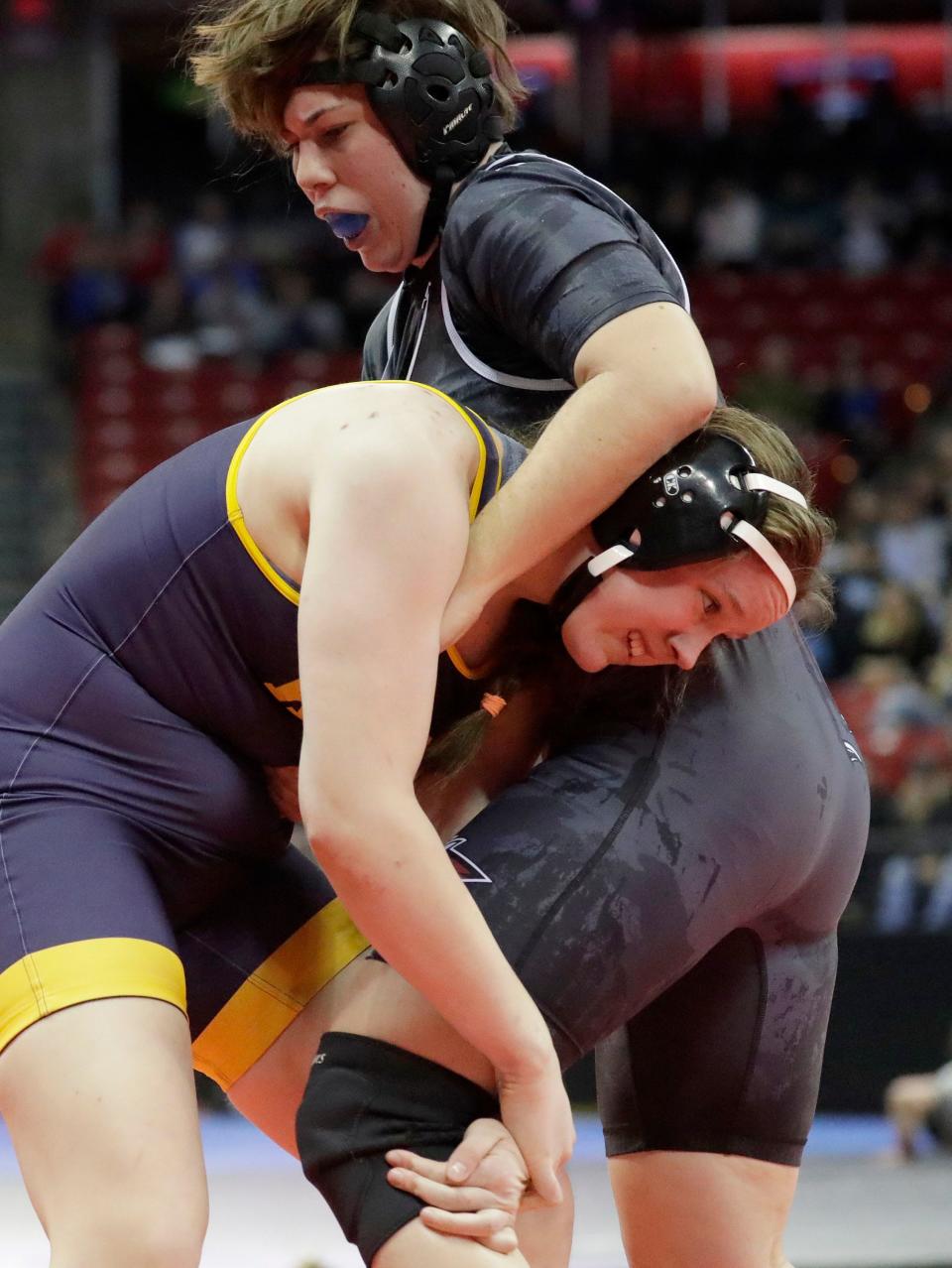 Wausau West’s Christiana Nordstrom, front, wrestles New Holstein’s Mercedes Kohlman in a 185-pound match during the WIAA Individual State Wrestling tournament at the Kohl Center, Thursday, February 23, 2023, in Madison, Wis.