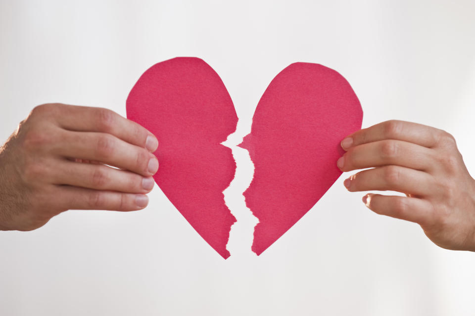 Dividing debt during a breakup comes down to the nature of your relationship and the state where you live. (Photo: Tetra Images via Getty Images)