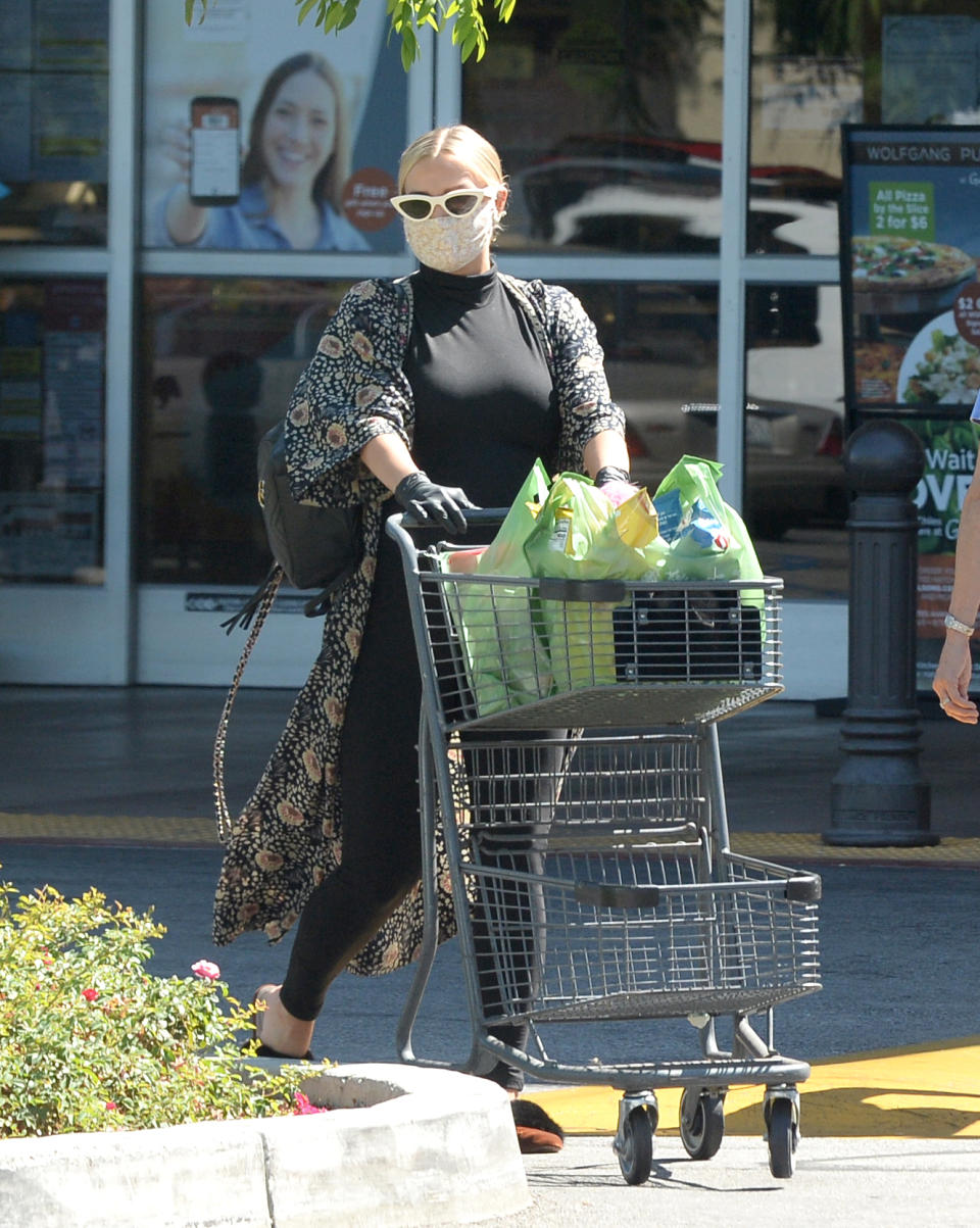 <p>Pregnant Ashlee Simpson stops by the supermarket to grab some groceries ahead of her husband Evan Ross’ birthday on Wednesday in Los Angeles. </p>