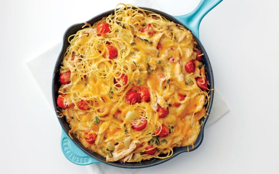 <p>Andrew Purcell for Parade</p><p>This satisfying casserole is an old Texan favorite. The version here uses a simple cheese sauce for the traditional canned <a href="https://www.yahoo.com/lifestyle/141-sensational-soup-recipes-warm-225625664.html" data-ylk="slk:soup;elm:context_link;itc:0;sec:content-canvas;outcm:mb_qualified_link;_E:mb_qualified_link;ct:story;" class="link  yahoo-link">soup</a>, blackened vegetables for a lively punch of fire-roasted flavor, and shredded rotisserie chicken as a shortcut protein. </p><p><strong>Get the recipe: <a href="https://parade.com/272846/lisafain/homesick-texans-chicken-spaghetti/" rel="nofollow noopener" target="_blank" data-ylk="slk:Homesick Texan's Chicken Spaghetti;elm:context_link;itc:0;sec:content-canvas" class="link ">Homesick Texan's Chicken Spaghetti</a></strong></p>