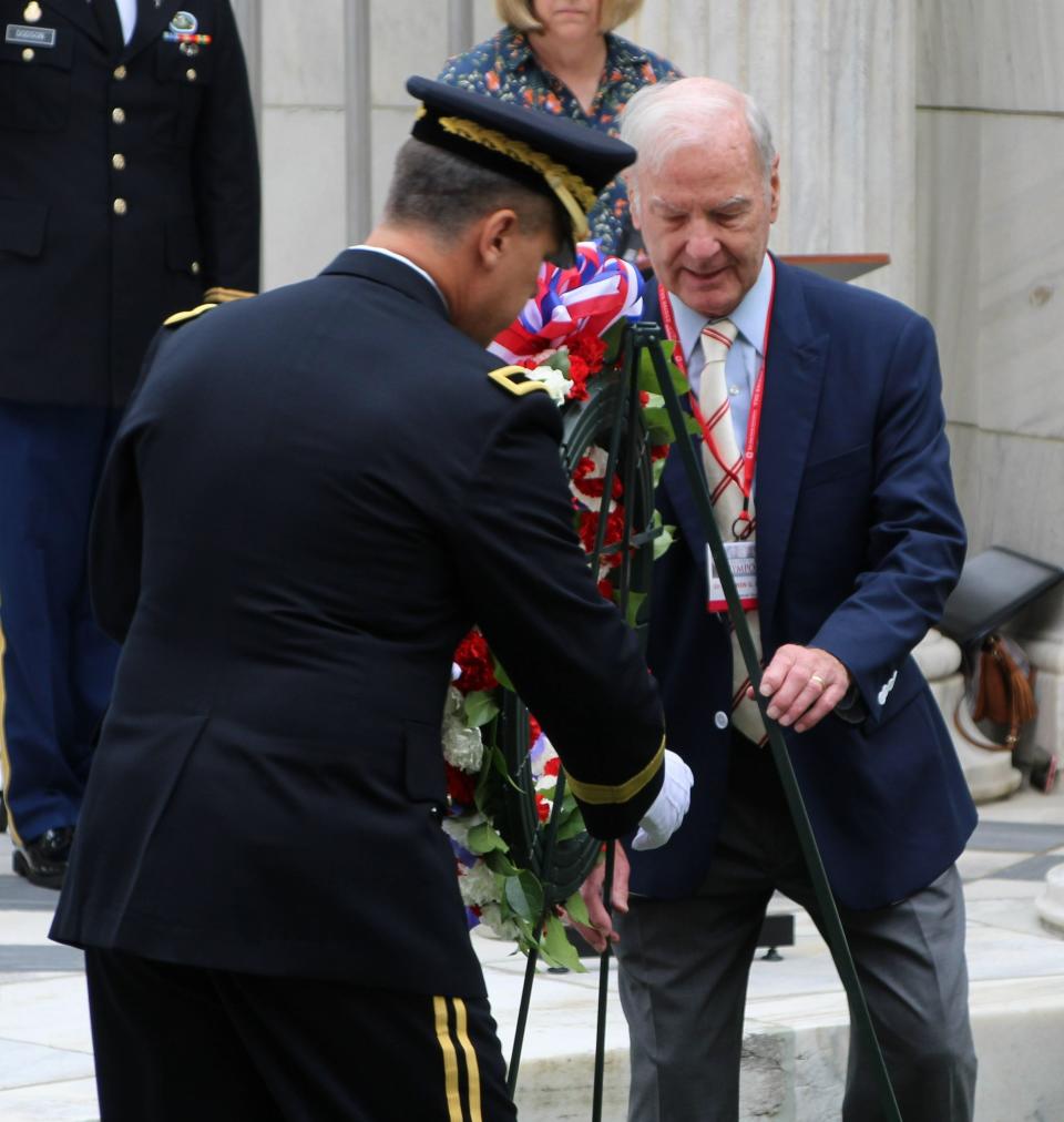 Dr. Warren G. Harding III, right, and Brigadier Gen. Andrew F. Scarcella lay a wreath at the tomb of President Warren G. Harding during a ceremony at the Harding Memorial in Marion. A wreath also was laid at the tomb of Florence Harding, the president's wife, who also is buried at the Harding Memorial.