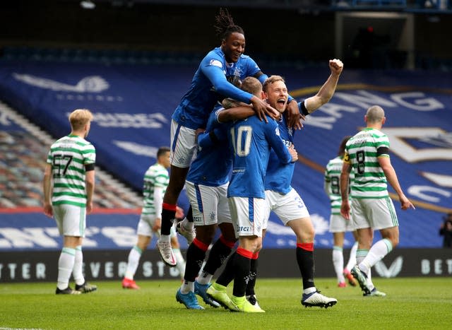 Steven Davis celebrates scoring against Celtic