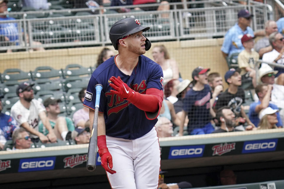 Minnesota Twins' Ryan Jeffers (27) watches his grand slam in the fourth inning of a baseball game against Detroit Tigers, Wednesday, July 28, 2021, in Minneapolis. (Glen Stubbe/Star Tribune via AP)