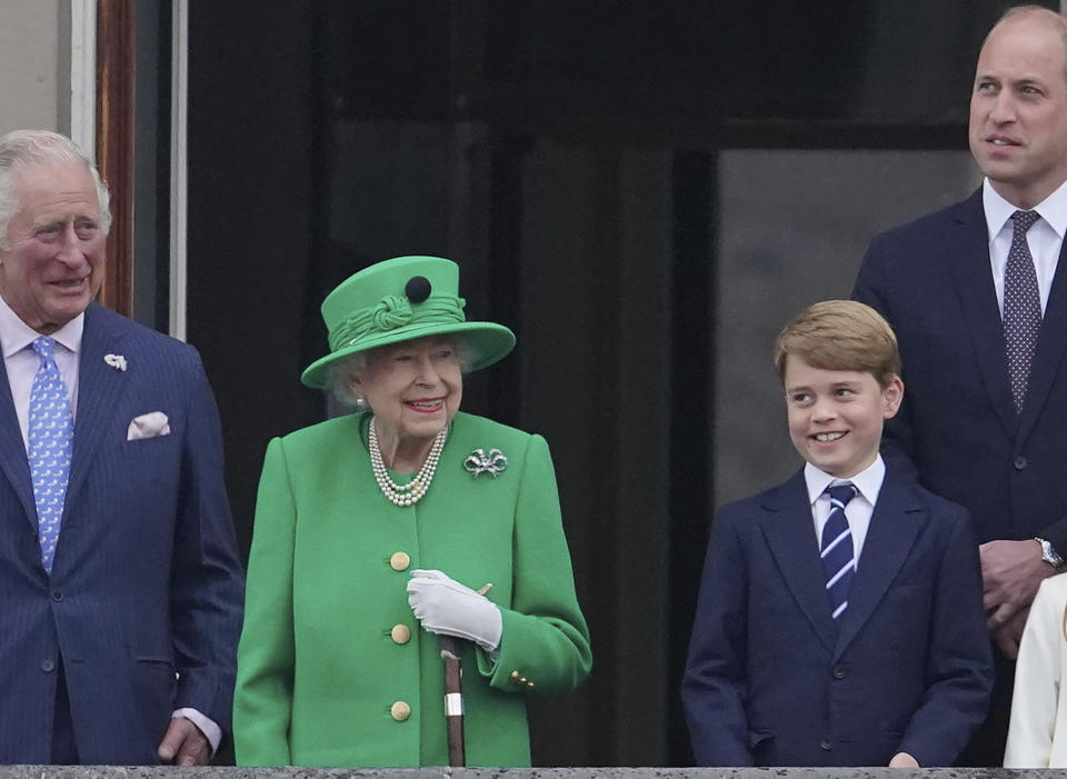 From left, Prince Charles, Queen Elizabeth II, Prince George and Prince William appear on the balcony of Buckingham Palace during the Platinum Jubilee Pageant outside Buckingham Palace in London, Sunday June 5, 2022. After four days of parades, street parties and a gala concert celebrating Queen Elizabeth II's 70 years on the throne, the Platinum Jubilee ended Sunday with the crowd outside Buckingham Palace singing "God Save the Queen." But as the tributes to the queen's lifetime of service begin to fade, Britain is left with the reality that the second Elizabethan age is coming to an end. (Jonathan Brady/Pool Photo via AP)