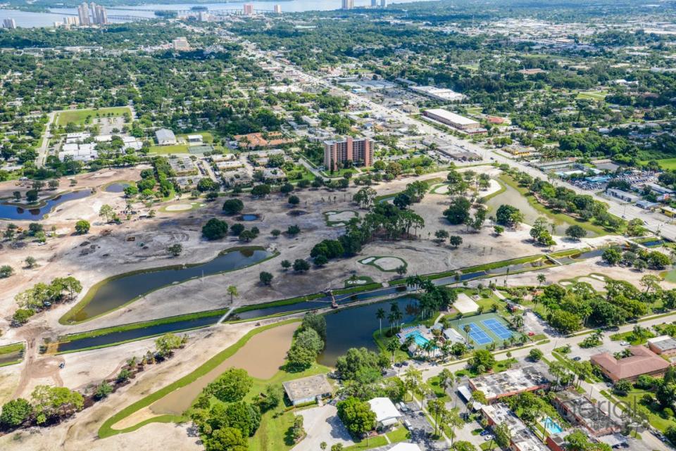 In the Know: The Bonair Towers adjacent to Fort Myers Country Club golf course renovation in aerial taken in July 2014.