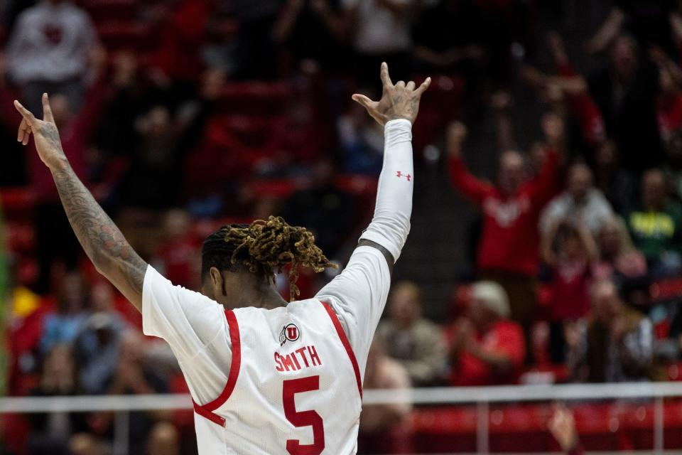 Utah Utes guard Deivon Smith (5) celebrates a buzzer beater at the end of the first half during a game against the Oregon Ducks at the Huntsman Center in Salt Lake City on Jan. 21, 2024. The Utes won 80-77.