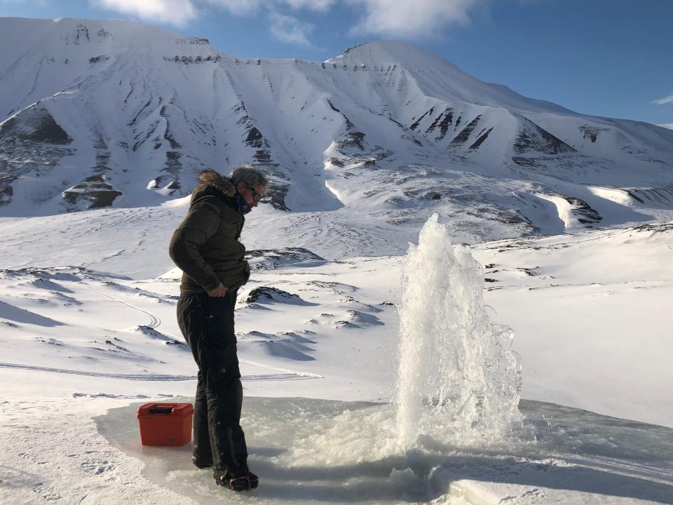 Water bursts out of a spring in Svalbard.