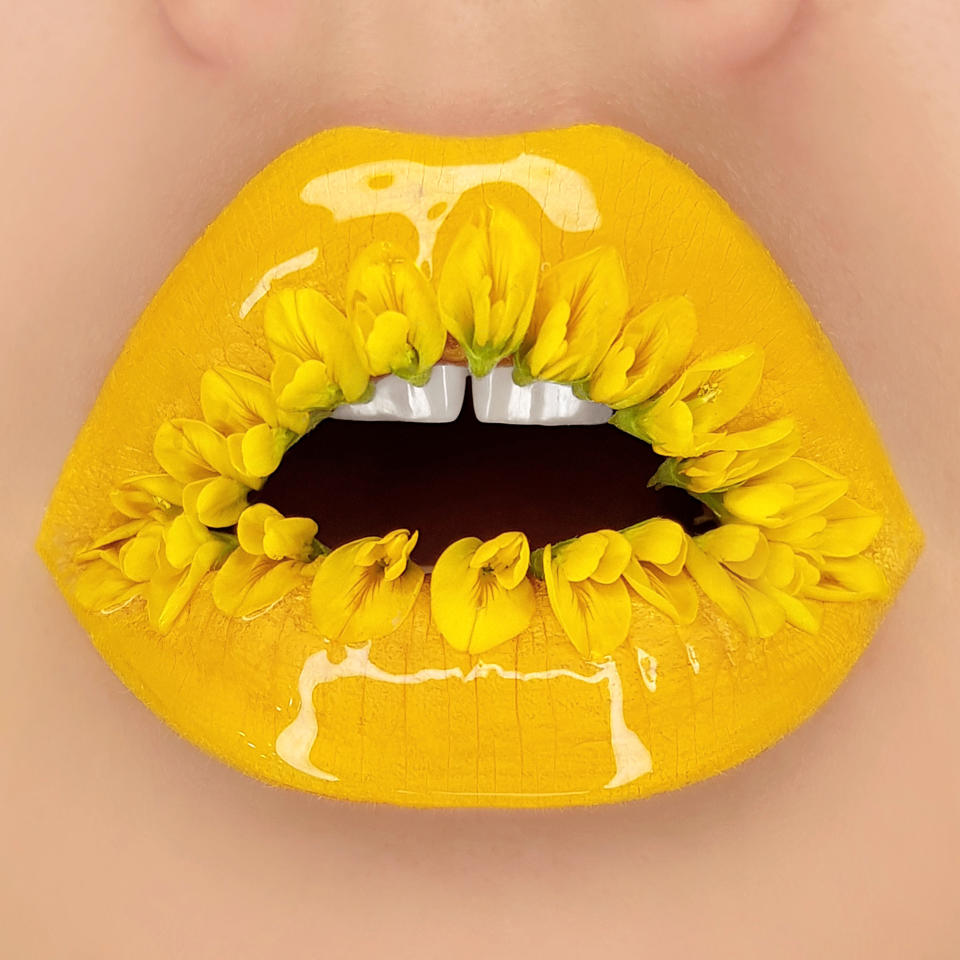 Tutushka's lipstick artwork featuring a sunflower. (Photo: Tutushka Matviienko/Caters News)