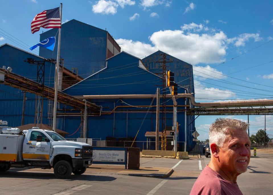 A man looks for oncoming traffic as he leaves the U.S. Steel Granite City Works steel factory on Wednesday, Aug. 30, 2023, in Granite City, Ill.