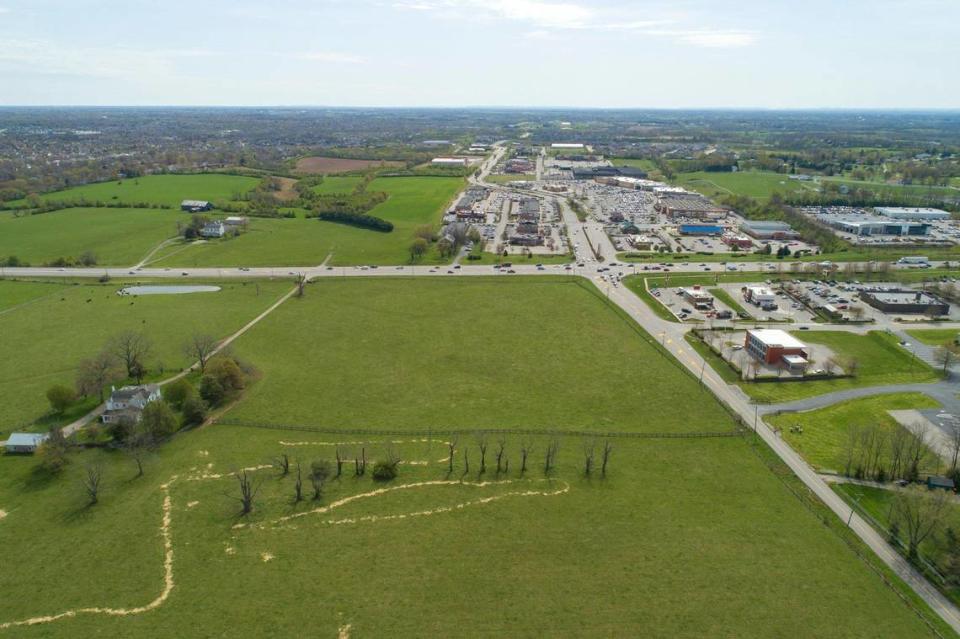 A new development with hundreds of apartments and townhomes and a retail shopping center with a hotel, several restaurants and a major grocery store has been approved by Nicholasville officials for a location across from Brannon Crossing in Jessamine County, Ky.