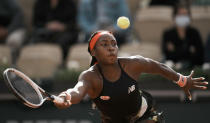 United States's Coco Gauff plays a return to United States's Jennifer Brady during their third round match on day 7, of the French Open tennis tournament at Roland Garros in Paris, France, Saturday, June 5, 2021. (AP Photo/Thibault Camus)