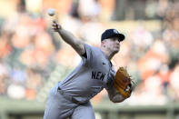 New York Yankees starting pitcher Clarke Schmidt throws during the first inning of a baseball game against the Baltimore Orioles, Monday, April 29, 2024, in Baltimore. (AP Photo/Nick Wass)