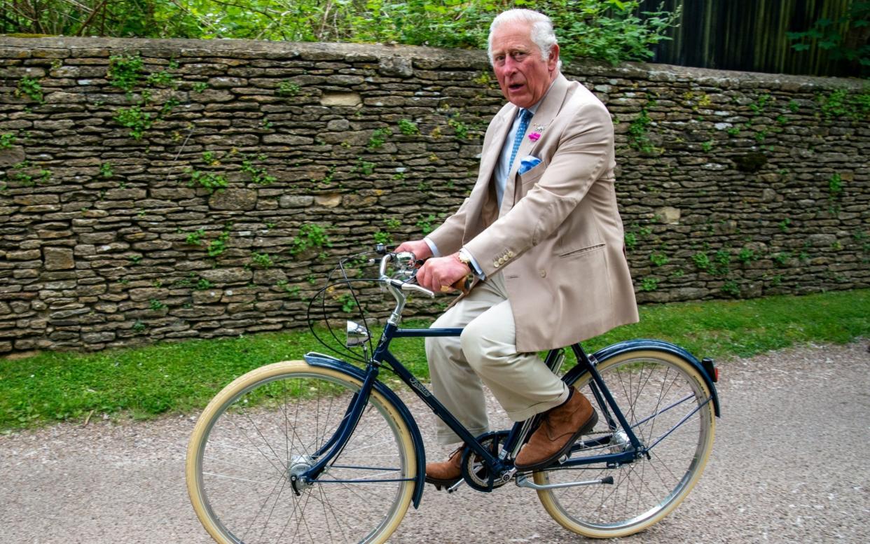 Prince Charles joins members of the British Asian Trust for a short bicycle ride  - Arthur Edwards - WPA Pool/Getty Images