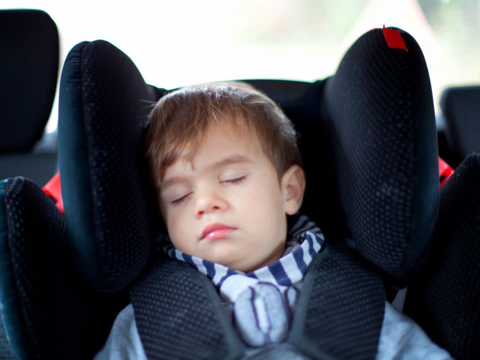 A sleeping child making no noise can lead to forgetfulness (posed by model). Source: Getty