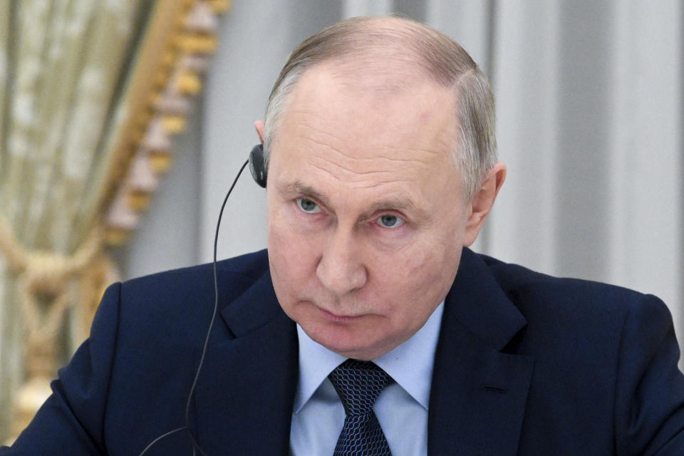 Russian President Vladimir Putin speaks to India's Foreign Minister Subrahmanyam Jaishankar during their meeting at the Kremlin in Moscow, Russia, Wednesday, Dec. 27, 2023. (Alexei Nikolsky, Sputnik, Kremlin Pool Photo via AP)