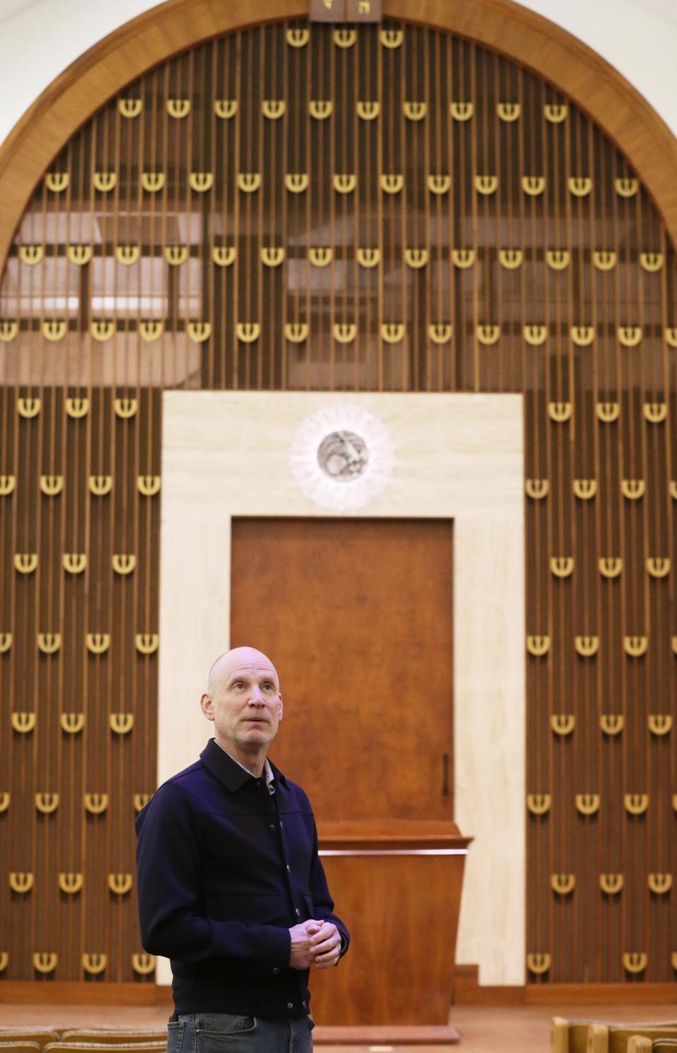 Bobby Selvaggio, executive director of Creative Arts Collaborative Center, talks about the Highland Square Universal Gathering Place, HUG art center, in the former Temple Israel on Thursday.