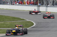 Red Bull Racing driver Sebastian Vettel (L) of Germany leads McLaren Mercedes driver Lewis Hamilton (R) of Britain and Ferrari driver Fernando Alonso of Spain in the Canadian Formula One Grand Prix on June 10, 2012 at the Circuit Gilles Villeneuve in Montreal. AFP PHOTO/DON EMMERTDON EMMERT/AFP/GettyImages