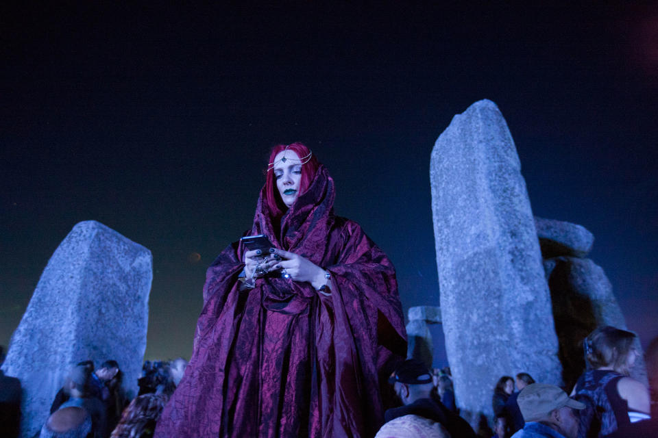 <p>Revellers celebrate summer solstice and the dawn of the longest day of the year at Stonehenge on June 21, 2017 in Wiltshire, England. (Photo: Kiran Ridley/Barcroft Images/Barcroft Media via Getty Images) </p>