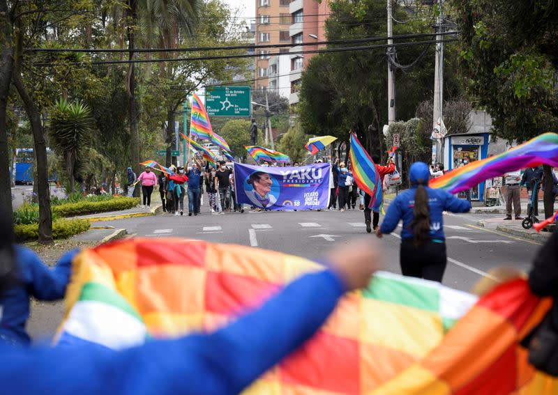 Supporters of Ecuador's presidential candidate Yaku Perez gather outside a hotel, in Quito