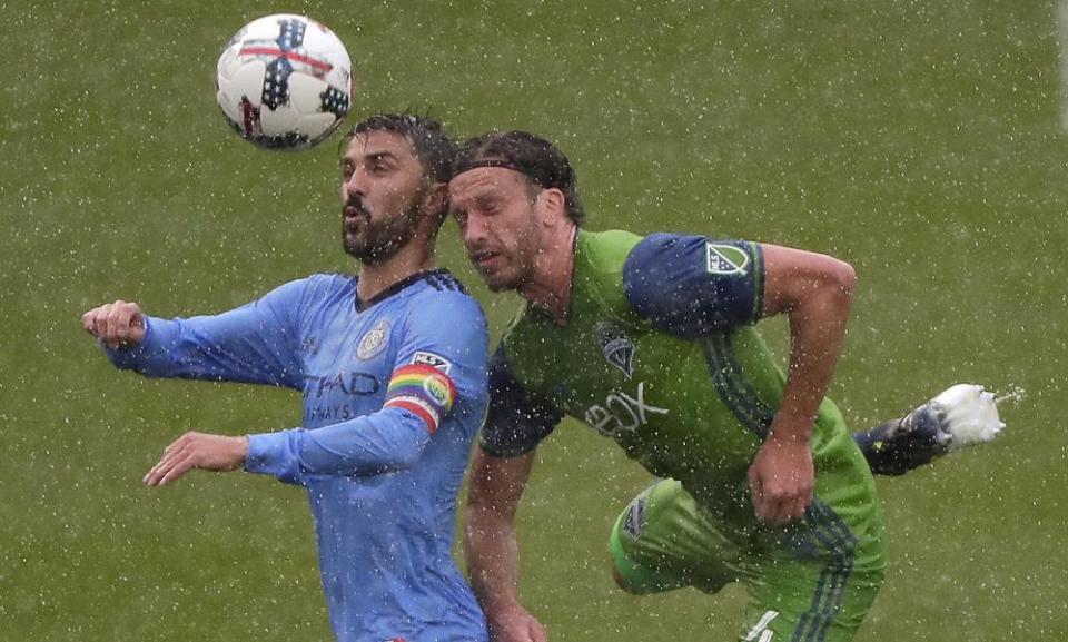 David Villa scored two goals in the heavy rain on Saturday afternoon