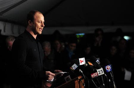 Tim Ryce, brother of murdered nine-year-old Jimmy Ryce, speaks with reporters outside Florida State Prison following the execution of Juan Carlos Chavez in Starke, Florida February 12, 2014. REUTERS/David Manning (