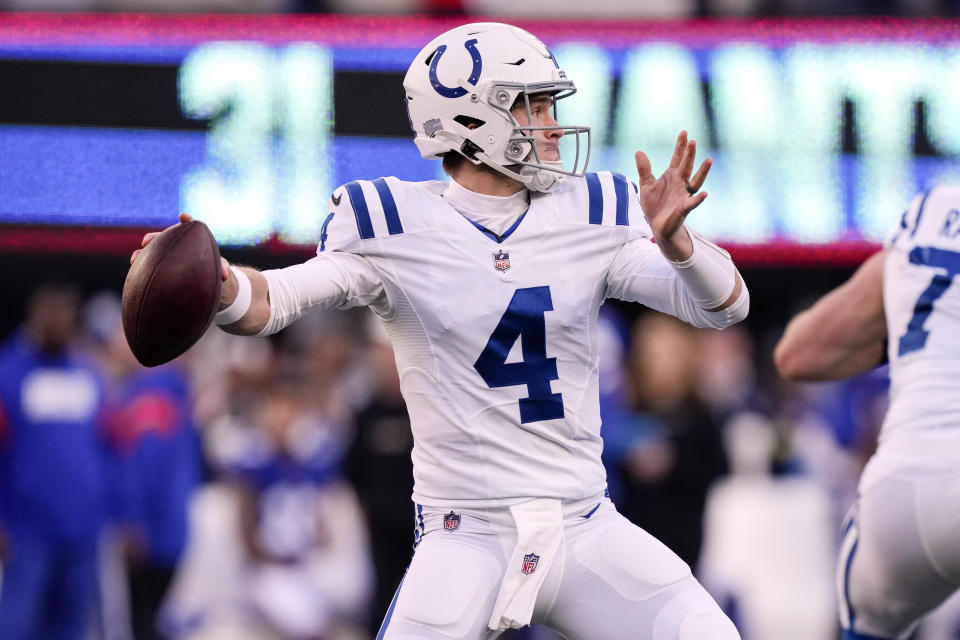 Indianapolis Colts quarterback Sam Ehlinger (4) throws a pass during the second half of an NFL football game against the New York Giants, Sunday, Jan. 1, 2023, in East Rutherford, N.J. (AP Photo/Bryan Woolston)