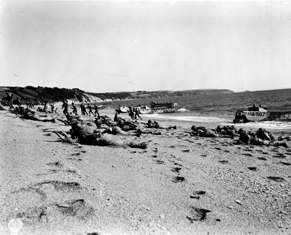 American troops landing on beach in England during rehearsal for invasion of Nazi occupied France