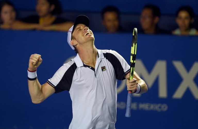 Sam Querrey of the US celebrates beating Rafael Nadal of Spain 6-3, 7-6 (7/3) in the ATP men's singles finals of the Mexican Tennis Open in Acapulco