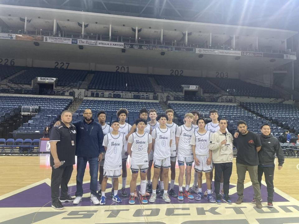 Venture Academy boys basketball team posses for team photo following the Stockton Kings Classic at the Stockton Arena on Saturday, Jan. 14.