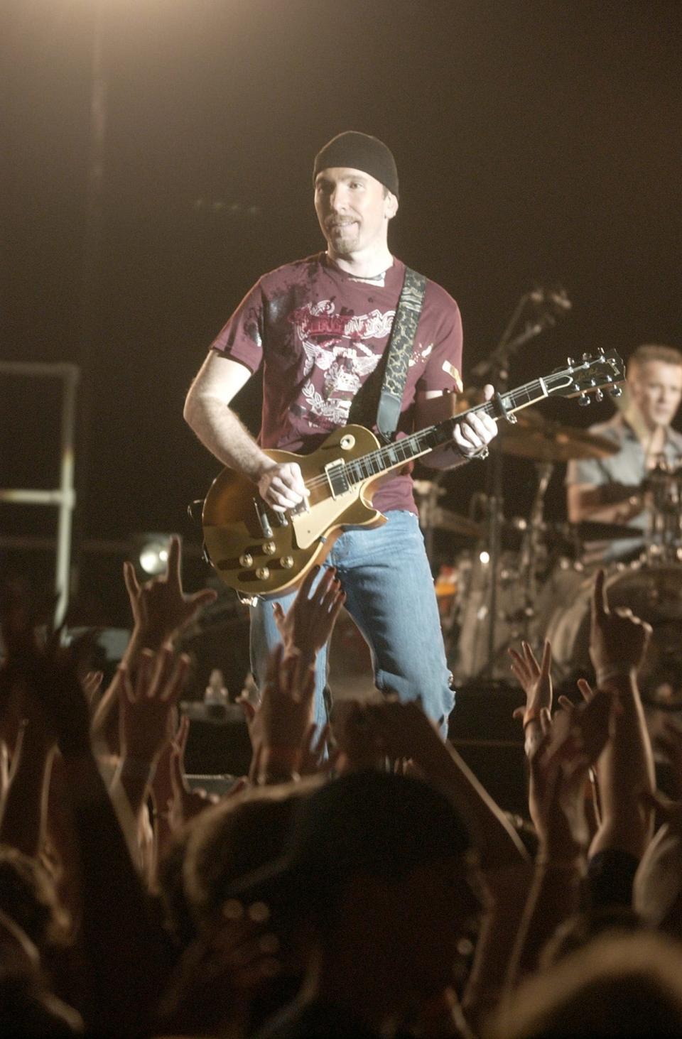 U2's The Edge performs Oct. 10, 2001, to a sold-out arena at the University of Notre Dame's Joyce Athletic and Convocation Center.