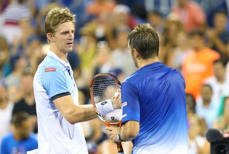 Sep 9, 2015; New York, NY, USA; Kevin Anderson of South Africa (left) shakes hands with Stan Wawrinka of Switzerland (right) after their match on day ten of the 2015 U.S. Open tennis tournament at USTA Billie Jean King National Tennis Center. Mandatory Credit: Jerry Lai-USA TODAY Sports