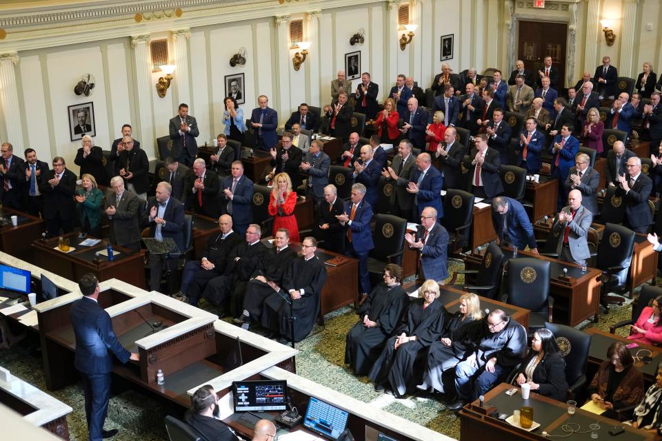 Republicans react Monday as Gov. Kevin Stitt presents his State of the State address.