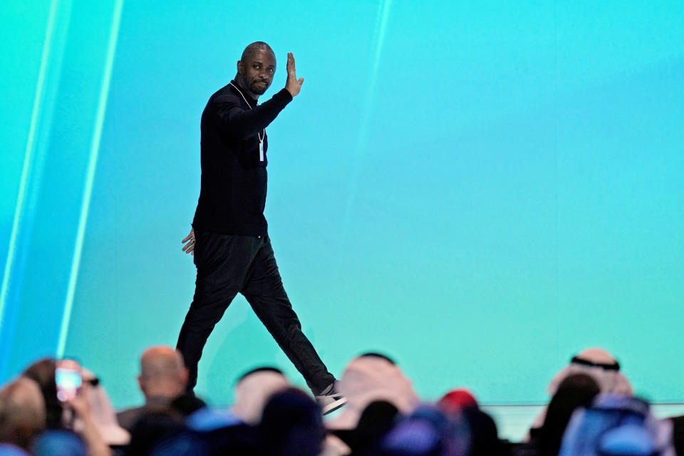 British actor Idris Elba arrives on stage during the World Government Summit in Dubai, United Arab Emirates, Tuesday, Feb. 14, 2023. While on stage, Elba brought up the persistent discussions about him taking over as Ian Fleming's famed British spy 007. (AP Photo/Kamran Jebreili)