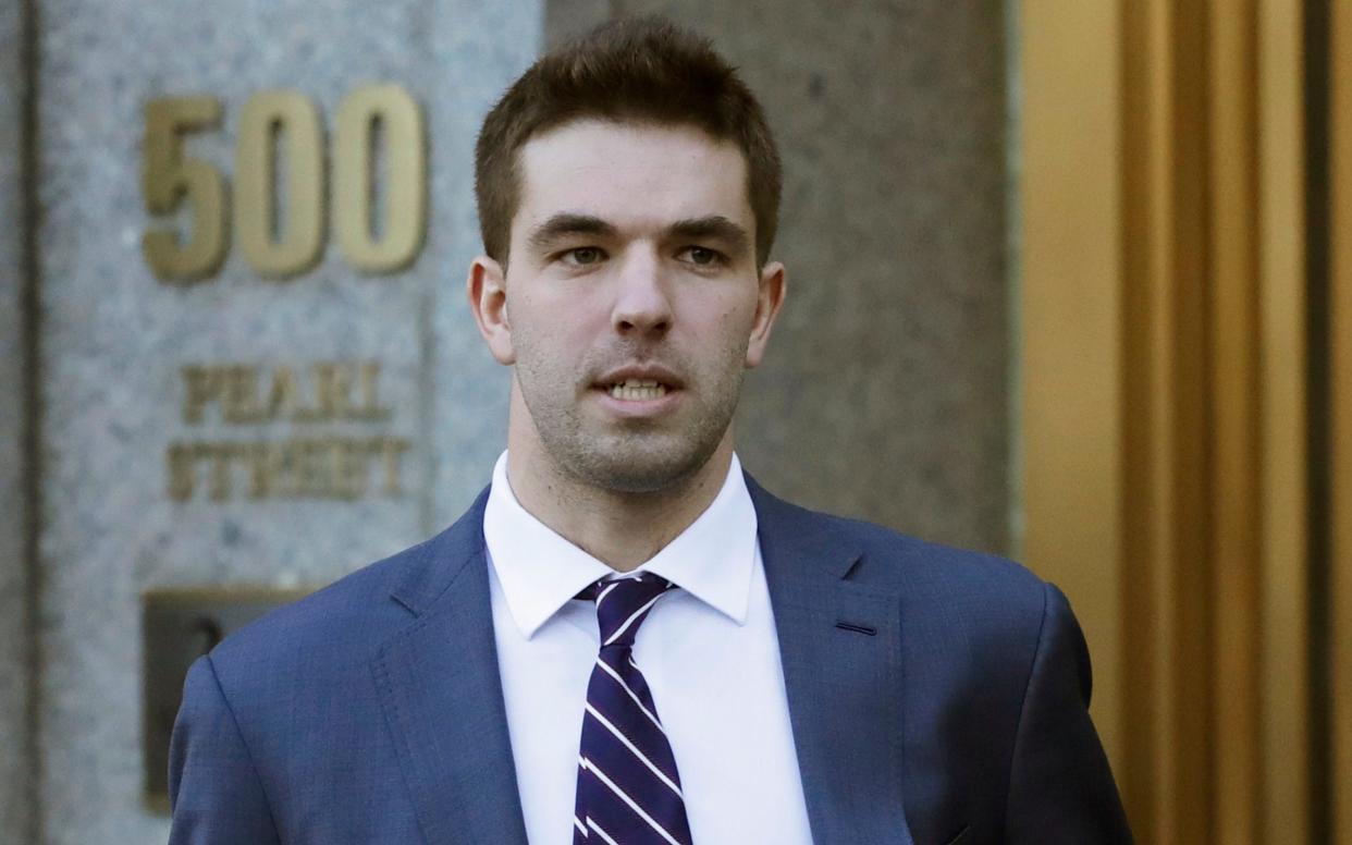 Billy McFarland, the promoter of the failed Fyre Festival in the Bahamas, leaves federal court after pleading guilty to wire fraud charges in July - AP