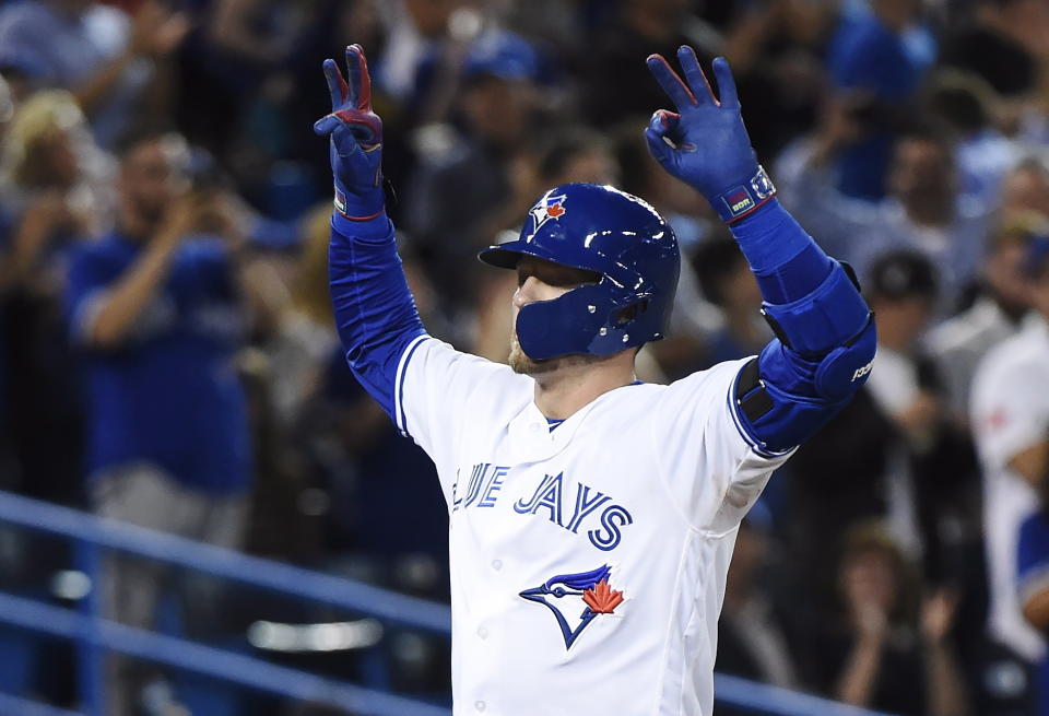 Josh Donaldson celebrates his huge homer to the fifth deck at Rogers Centre. (AP)