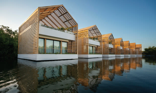 <p>Banyan Tree Mayakoba</p><p>Located in Mexico’s Yucatan region, <a href="https://go.skimresources.com?id=113896X1572730&xs=1&url=https%3A%2F%2Fwww.tripadvisor.com%2FHotel_Review-g150812-d1218761-Reviews-Banyan_Tree_Mayakoba-Playa_del_Carmen_Yucatan_Peninsula.html&sref=https%3A%2F%2Fparade.com%2F1002608%2Fmarynliles%2Fbest-anniversary-getaways%2F" rel="noopener" target="_blank" data-ylk="slk:Banyan Tree Mayakoba;elm:context_link;itc:0;sec:content-canvas" class="link ">Banyan Tree Mayakoba</a> is nestled in a private gated community linked by canal waterways in the heart of Mexico’s Riviera Maya. Here you can spend your nights in a two-story floating lagoon villa and your days playing 18 holes of championship golf at the Greg Norman-designed El Camaleón Golf Course or exploring downtown Playa del Carmen, where there are blocks of shops and restaurants lined with palm trees.</p>