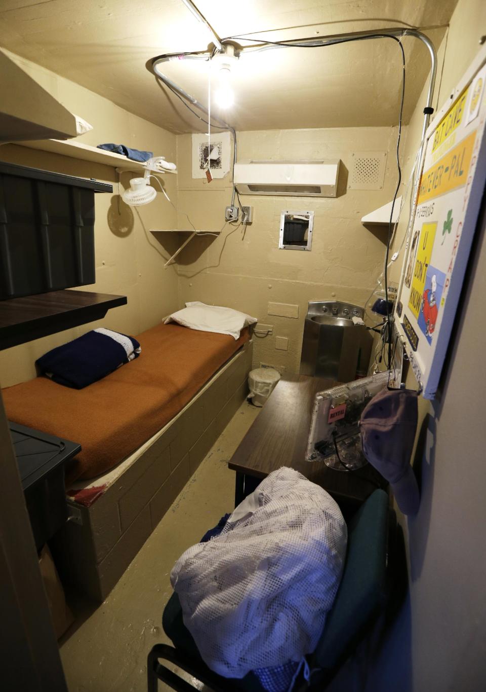 This Nov. 18, 2013, photo shows the inside of an inmate's cell at the Iowa State Penitentiary, in Fort Madison, Iowa. The penitentiary, the oldest in use west of the Mississippi River with a history dating back to 1839, is set to close when a $130 million replacement opens down the road next year. (AP Photo/Charlie Neibergall)