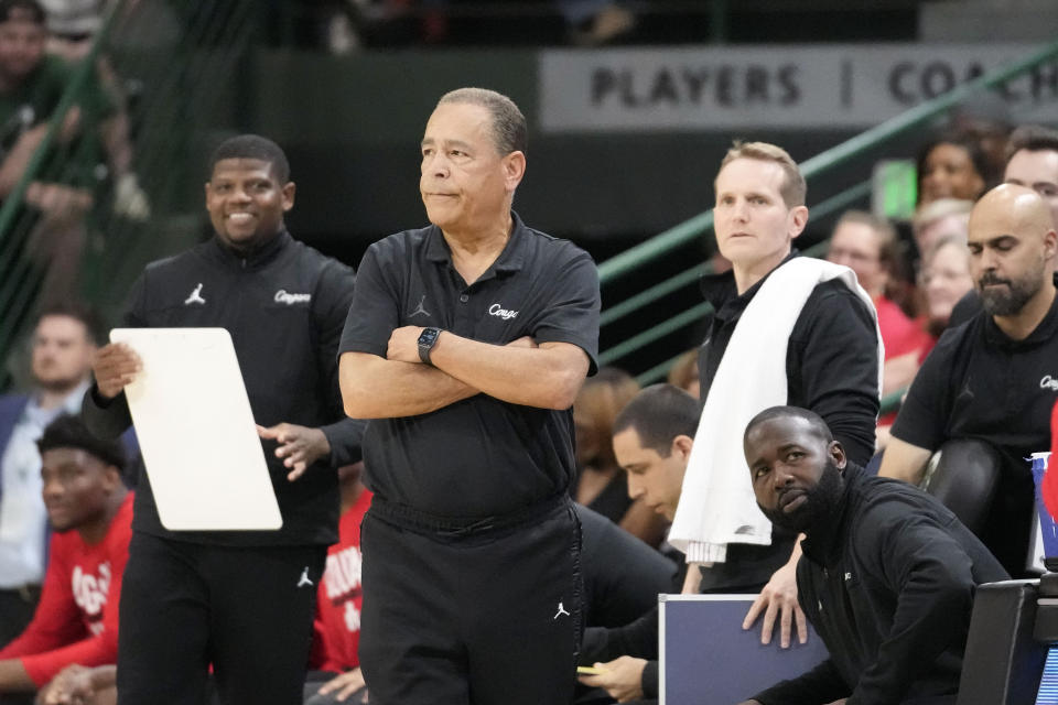 Houston head coach Kelvin Sampson watches from the bench after he called a timeout during the second half of an NCAA college basketball game against Tulane in New Orleans, Tuesday, Jan. 17, 2023. (AP Photo/Gerald Herbert)